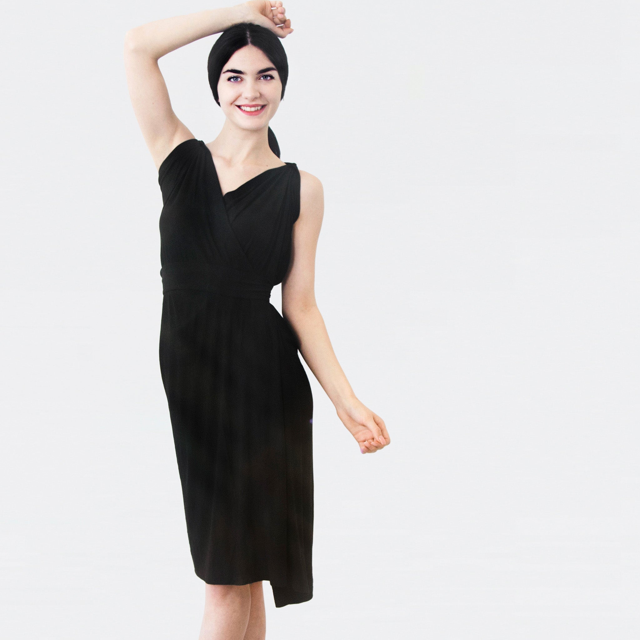 Woman wearing black versatile dress