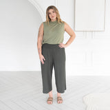 The Going Places Sleeveless Mock Neck
