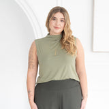 The Going Places Sleeveless Mock Neck