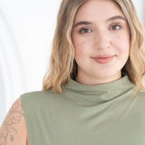 The Going Places Sleeveless Mock Neck