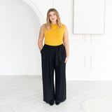 The Going Places Sleeveless Mock Neck