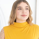 The Going Places Sleeveless Mock Neck