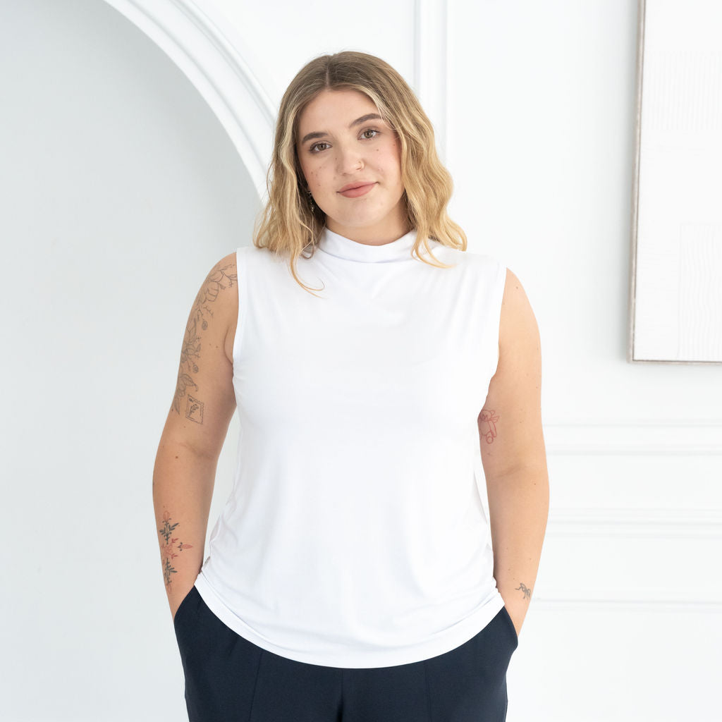 The Going Places Sleeveless Mock Neck